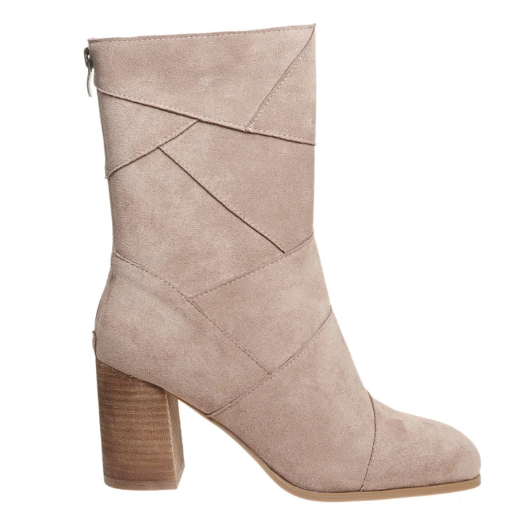 A mid-calf ankle boot in light taupe suede with a chunky brown block heel, shown from a side profile view against a plain white background.