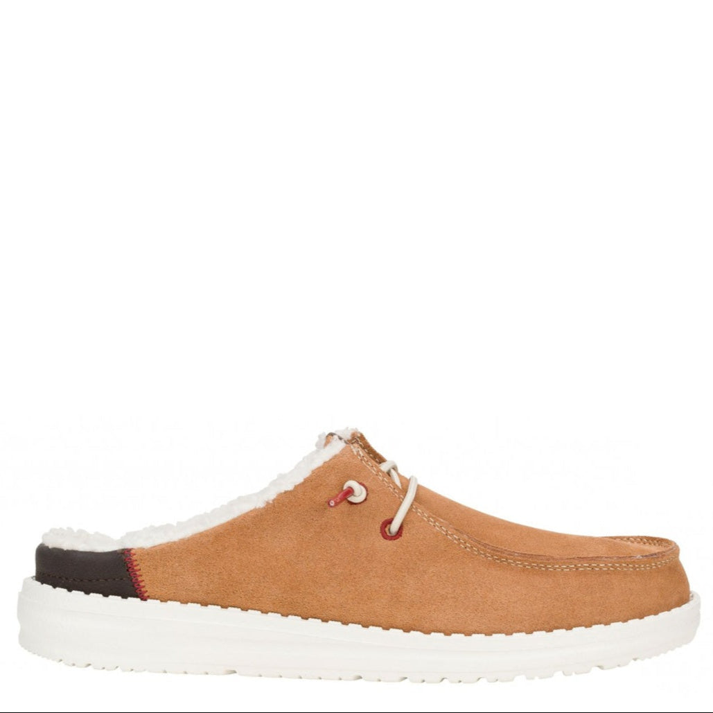 Brown slip-on shoe with white sole on a white background
